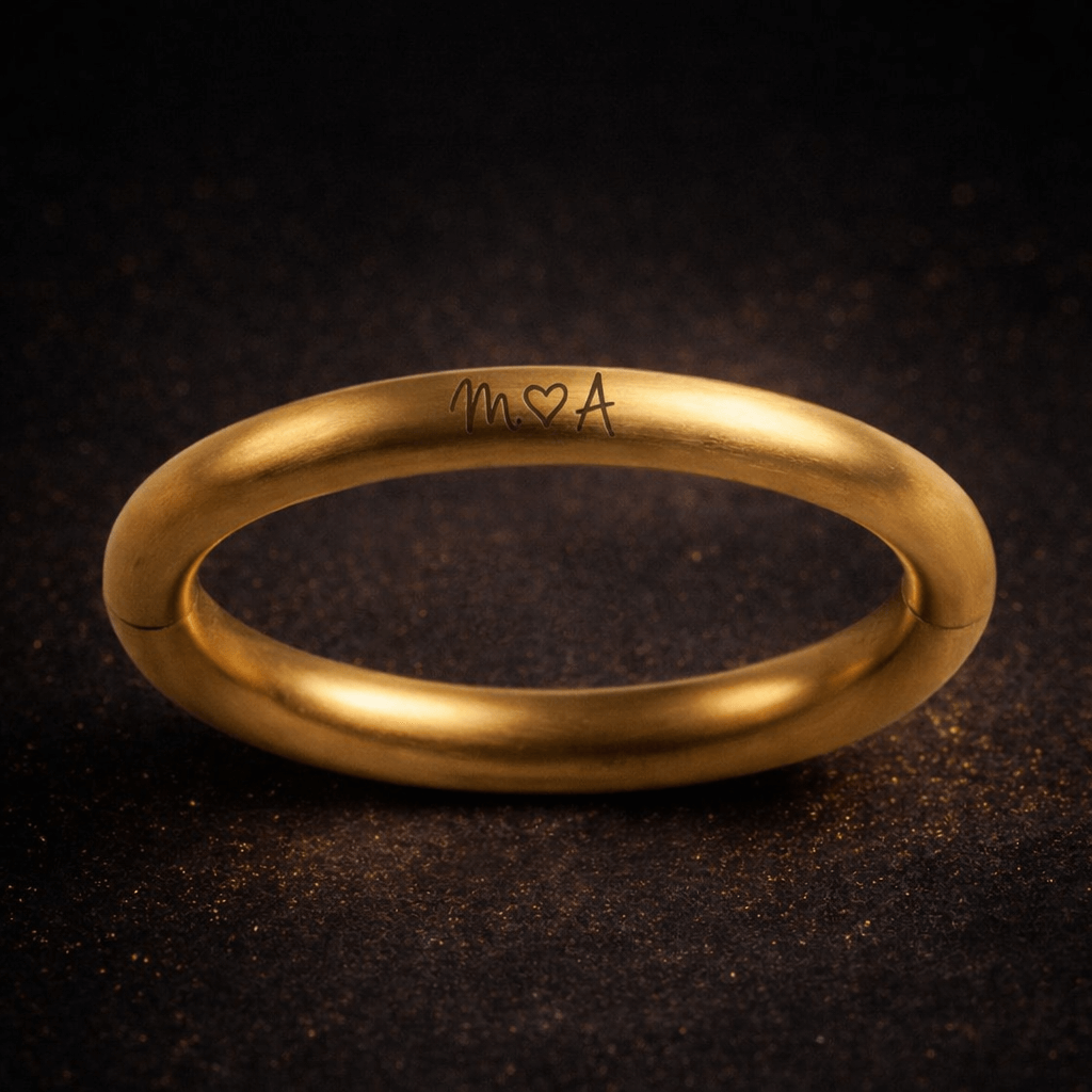 Solid brass bull ring bracelet with custom engraving, front view product photo