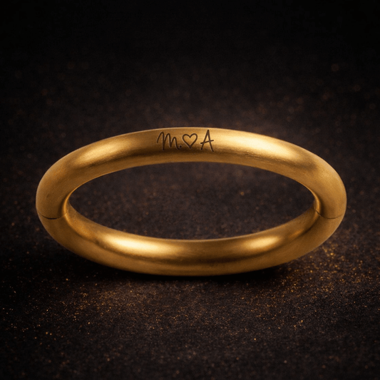 Solid brass bull ring bracelet with custom engraving, front view product photo